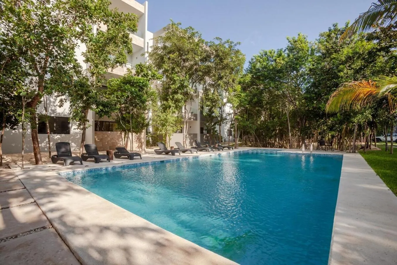 Casa de Férias Modern Condo Wifi 200Mb, 2 Gyms, 6Pools, Balcony Playa del Carmen